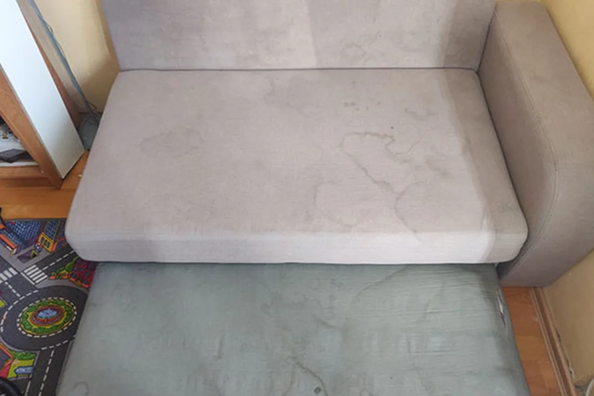Armchair with watermarks on the seat — before cleaning