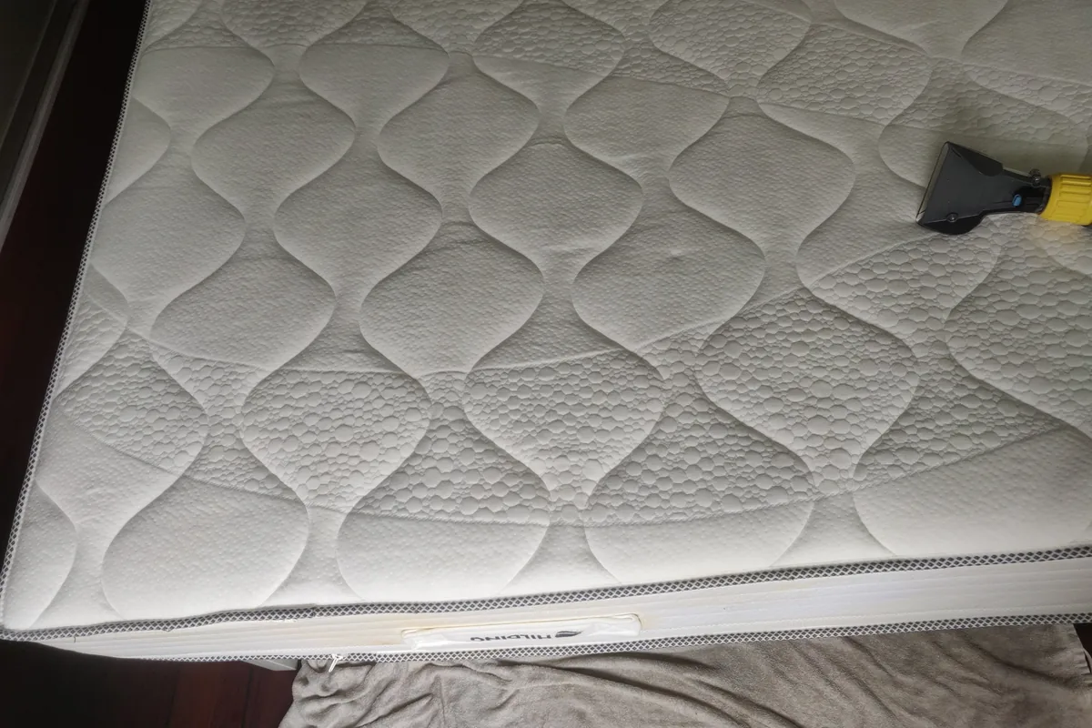 Mattress edge with rust-coloured staining — after cleaning by SevenClean