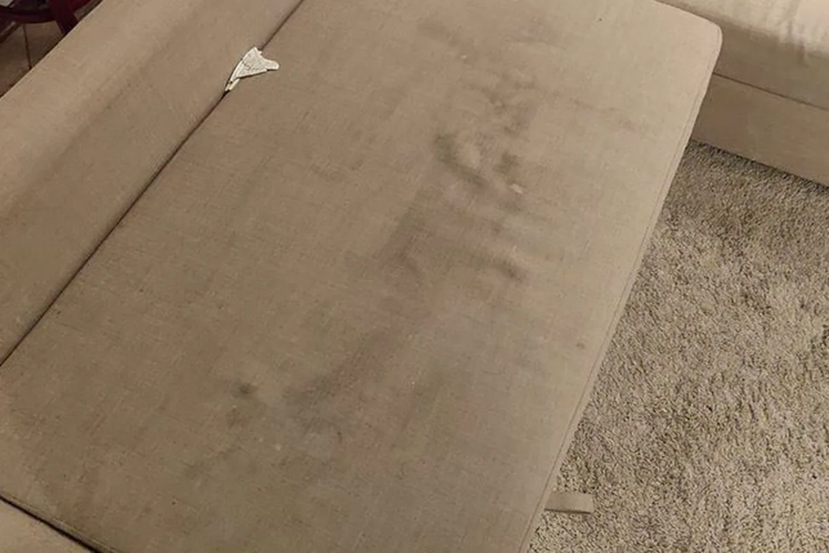 Fabric sofa seat, general soiling — before cleaning