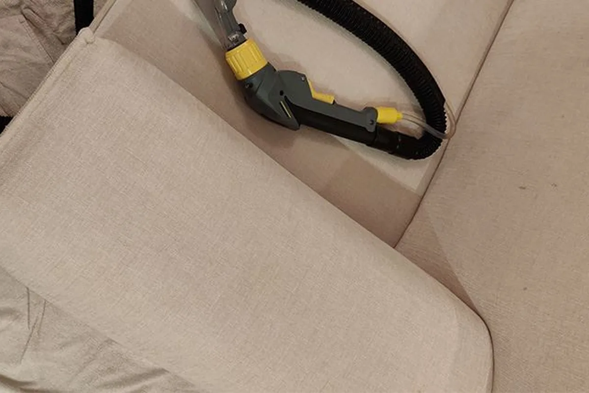 Sofa arm and back, heavy edge soiling — after cleaning by SevenClean