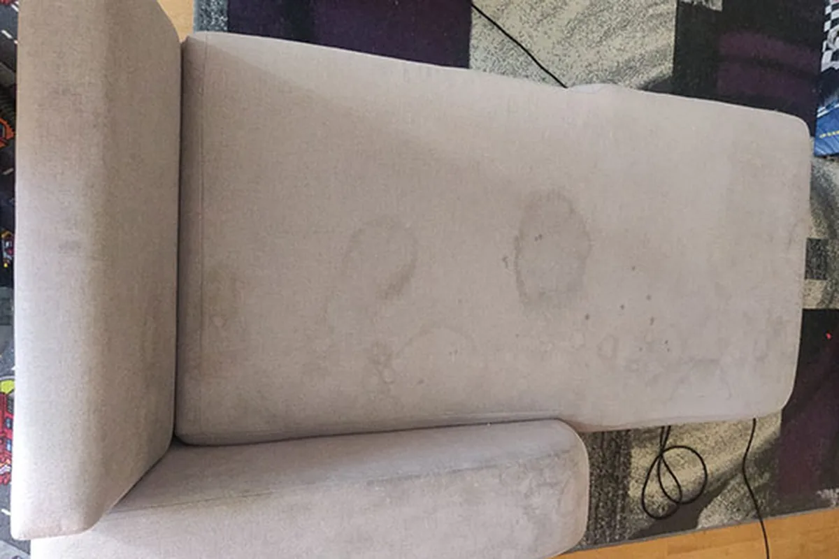 Sofa back and seat, marks along the seam — before cleaning